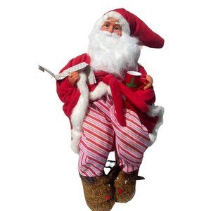 Santa sitting with cup of coffee large